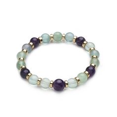 This Beaded Gemstone Bracelet features; 8mm Rainbow Fluorite, and 10mm Amethyst Natural Stone Beads with Light Gold-Plated Hematite Spacer Beads.   Item Features: - Strung on a stretchy elastic cord. - The bracelet stretches and fits a typical women's wrist approx. 7.5 inches - Easy slip on and off - Light Gold-Plated Hematite Spacer Beads. - Centerpiece bead measures 10 mm; the rest of the beads are 8mm. Beaded Bracelet Diy, Fluorite Bracelet, Stretchy Beaded Bracelet, Onyx Crystal, Natural Stone Beads, Natural Stone Bracelets, Bracelet Diy, White Jade, Amethyst Bracelet