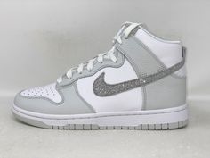 Nike Dunk High 'Silver Glitter Swoosh' White Sneakers, Size 7.5 BNIB FJ4578-100 Brand new in box. Box lid is missing. Shoes are unworn, pristine condition. Size 7.5 If you need item sooner ask about expedited shipping Nike Fashion Shoes, Nike Dunk High, Dunk High, Nike Fashion, Nike Dunk, Nike Dunks, White Sneakers, Silver Glitter, Fashion Shoes