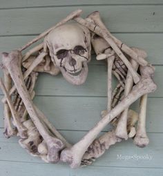 a skeleton wreath is hanging on the wall