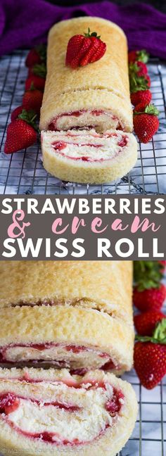 strawberries and cream swiss roll on a cooling rack