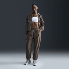 With both a water-repellent finish and built-in UV protection, these oversized pants are ready come rain or shine. Their lightweight woven fabric is partially lined with sweat-wicking mesh to help keep you cool and dry. Oversized Pants, Rain Or Shine, Cold Hands, Women Lifestyle, Keep Your Cool, Nike Sportswear, Jogger Pants, Repellent, Water Repellent