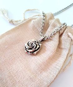 ★ Rose Flower Pendant ★ A beautiful handcrafted Rose Flower pendant/necklace for Men and Women. * Materials/Finishes ➤ Artificially Aged (Black/Grey Oxidized) Silver 925 * Dimensions ➤ 2.2 x 1.9 x 0.9 cm (~ 0.9 x 0.7 x 0.3 inches)/Bail: Suitable for up to 3.0 mm (~ 0.1 inches) Chain  * Weight: ~ 11 grams in Silver 925 ----------------------------------------------------------------------------- IMPORTANT NOTES: ----------------------------------------------------------------------------- ➤ When Silver Jewelry With Roses For Gift, Silver Rose Design Necklace For Anniversary, Rose Sterling Silver Necklace For Anniversary, Sterling Silver Necklace With Rose Design In Rose Color, Rose Colored Sterling Silver Necklace With Rose Design, Rose-colored Sterling Silver Necklace For Anniversary, Rose Sterling Silver Necklace For Gift, Rose Pendant Necklace In Sterling Silver, Rose Sterling Silver Necklace With Rose Design