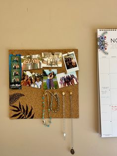 a cork board with pictures and jewelry hanging on it