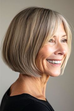 Straight Bob With Center Part Hairstyle on smiling older woman with brown hair. Center Part, Bob With Bangs