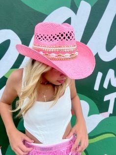 This custom pink cowgirl hat is the perfect way to add a touch of style to your western wardrobe. Made to order from high-quality straw, it features a wide brim to keep you cool in hot weather and  decorated with gold chains, seashells, and pearls. It's sure to turn heads wherever you go. Colorful Cowgirl Hats, Coastal Cowgirl Hat, Pink Cowgirl Hat, Straw Cowgirl Hat, Western Wardrobe, Bling Hat, Bachelorette Hats, Custom Cowboy Hats, Boots Diy