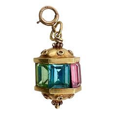 This is part of Chairish’s Fine Jewelry assortment.  This is a fun vintage 14K gold charm or pendant in the Victorian style. The gold tests 14k and the jump ring is also marked. The top and bottom have Etruscan beadwork. There are alternating faceted rectangular glass of pastel colors. Condition is excellent.  Dimensions: Height: 20mm; Width: 11mm; Weight: 4.7 grams Emerald Diamond Ring, Art Deco Pendant, Emerald Diamond, Victorian Style, Gold Charm, Mosaic Glass, Victorian Fashion, Vintage Charms, Vintage Gold