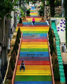 the stairs are painted in different colors and shapes to make them look like they're going down