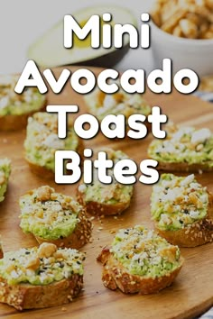 mini avocado toast bites on a wooden cutting board with the words, mini avocado toast bites