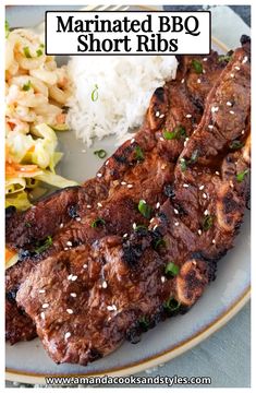 a plate with meat, rice and vegetables on it that says marinated bbq short ribs