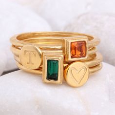 "Know someone with a May birthday ~ this is the perfect gift! Stackable birthstone rings are the IT accessory. Wear by itself or pair with with an initial ring! This listing is for one 24K gold vermeil stackable birthstone ring with a Swarovski crystal (please see color chart for color selection). Round, square, or rectangle stone settings are available. Want more rings or a different month? Build Your Own Gold Stackable Ring listing: https://www.etsy.com/listing/250020772 Also, available in SIL Gold Stackable Rings With Initials For Everyday, Everyday Gold Stackable Rings With Initials, Gold Stackable Rings For May Birthstone, Gold Stackable Rings With May Birthstone, Gold Stackable Rings With Gemstones For May Birthstone, Gold Stackable Rings With Initials, Gold Stackable Emerald Ring For Anniversary, Gold Stackable May Birthstone Rings, Gold Stackable Jewelry With May Birthstone