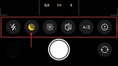 an image of some buttons and numbers on a black background with red arrow pointing to them