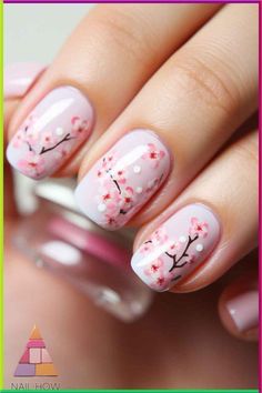 Embrace the beauty of spring with these cherry blossom nail art designs. Each nail is a canvas displaying soft pink blossoms against a clear background, perfect for a subtle yet stylish look. Visit NailHow.com for more trendy designs. Gel Nails Cherry Blossom, Cherry Blossom Gel Nails, Nail Art Cherry Blossom, Nails For Japan Trip, Sakura Nails Design, Japan Inspired Nails, Japanese Cherry Blossom Nails, Blossom Nail Designs, Clear Manicure