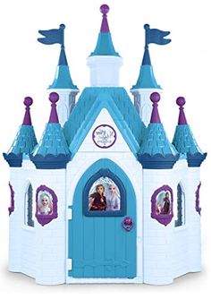 a toy castle with princess and prince figures on the front, including a blue door