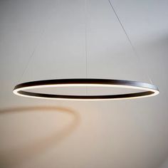 a circular light fixture hanging from the ceiling