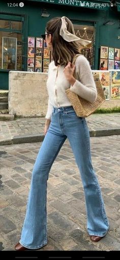 Blue Highwaist Jeans Outfit, Italian Jeans Woman, Flair Jeans Outfit 2023, Flared Jeans Boots Outfit, Light Blue High Waisted Jeans Outfit, Blue Flared Jeans Outfit Winter, Light Bell Bottom Jeans Outfit, Denim Flare Jeans Outfit Winter, Flare Jeans Outfit Platforms