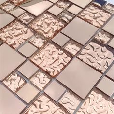 a close up view of some glass tiles