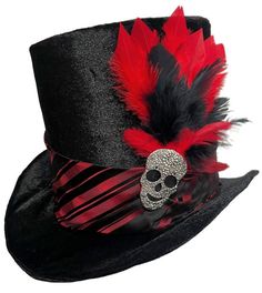 "Gothic Flair" Tall Gothic Steampunk Vampire Top Hat A one of a kind wearable art creation by Jenkitty This tall black velvet top hat is wrapped in a black and red striped band, and features a metal silver skull centerpiece, with a flourish of feathers. Adult Medium - Inner circumference measures about 22", about 7" tall (Around 7 1/8 men's hat size) Hat has wire brim so it can be moldable to your taste. Brand New Goth Top Hat, Helluvaboss Oc, Skull Centerpiece, Horror Wedding, Steampunk Vampire, Character Prompts, Black Velvet Top, Gothic Vampire, Gothic Steampunk