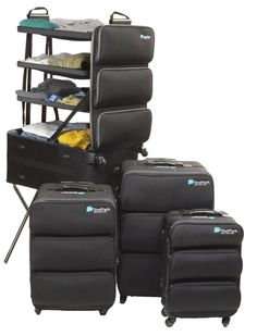 four pieces of luggage stacked on top of each other