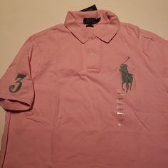 Ralph Lauren Big Pony Mesh Polo Pink Size Large Signature Embroidered Big Pony At The Left Chest In Green Cotton. An American Style Standard Since 1972, The Polo Shirt Has Been Imitated But Never Matched. Over The Decades, Ralph Lauren Has Reimagined His Signature Style In A Wide Array Of Colors And Fits, Yet All Retain The Quality And Attention To Detail Of The Iconic Original. This Roomy Version Features An Embroidered "3," Representing The Number Typically Worn By A Polo Team's Strongest Play Fitted Pink Polo Shirt With Short Sleeves, Pink Collared T-shirt For Summer, Pink Collared Tops For Spring, Fitted Pink Polo Collar T-shirt, Pink Polo Collar Top For Summer, Casual Pink Collared T-shirt, Pink Collared Cotton Shirt, Pink Cotton Collared Shirt, Pink Cotton Polo Shirt With Polo Collar