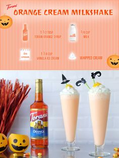 an orange cream milkshake with whipped cream and jack - o'- lanterns