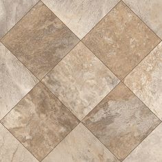 a tile floor that is made up of different colors and shapes, including beiges and browns