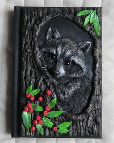 a painting of a raccoon in a tree with berries and leaves on it