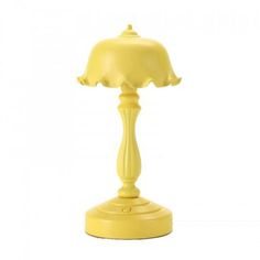 a yellow table lamp on a white background