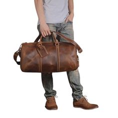 This Genuine Leather Duffel Bag is the ideal travel companion for both men and women. Made from high quality cow leather, it offers a large capacity for all your essentials, including a 15-inch laptop. With an adjustable and removable shoulder belt, this lightweight bag is perfect for stress-free travel. A distinctive feature of this duffel bag is a specifically designed shoe pocket. This compartment is separate from the main storage area, allowing you to keep your shoes isolated from your cloth Leather Duffel Bag, Leather Duffel, Shoulder Belt, Lightweight Bag, Storage Area, Duffel Bag Travel, Luggage Bag, Vintage Casual, Crazy Horse