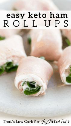 an easy keto ham roll up recipe with spinach and cheese on the top