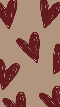 several red hearts drawn on a brown background