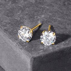 Ross-Simons - 2.00 ct. t. w. Cubic Zirconia Stud Earrings in 18kt Yellow Gold. Faux is fabulous. These 2.00 ct. t. w. round brilliant-cut CZ stud earrings dazzle in 18kt yellow gold. Post/clutch, CZ stud earrings. CZ weights are diamond equivalents. Gold Diamond Earrings With Vs Clarity, Round Cut, Gold Diamond Earrings With Vs Clarity For Anniversary, Vs Clarity Yellow Gold Diamond Earrings, Gold Solitaire Round Earrings, Gold Solitaire Diamond Earrings, Gold Solitaire Diamond Earrings Fine Jewelry, Gold Solitaire Diamond Earrings For Anniversary, Gold Solitaire Earrings, Yellow Gold Diamond Earrings With Vs Clarity