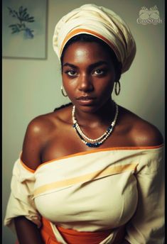 a woman in an orange and white dress with pearls on her head wearing a pearl necklace