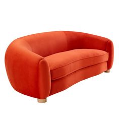 an orange couch sitting on top of a white floor