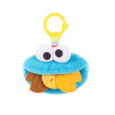 a blue stuffed animal with a pacifier in it's mouth on a white background