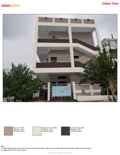 an apartment building with several balconies on the second floor