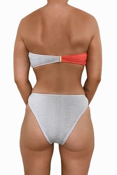 SUSTAINABLY PRODUCED - MADE WITH RECYCLED NYLON So stunning and in a smocked fabrication, this flattering bikini bottom is featured in a light gray color with a mid waist fit and moderate bottom coverage. Style with the Recycled Nylon Coral Gray Venice Bikini Top to recreate this look. Pull-on style Elasticized waist Moderate bottom coverage Crinkled finish Lined Color - Cloud Gray One Size fits most Self 1: 65% recycled nylon, 30% recycled poly, 5% elastane Self 2: 80% recycled nylon, 20% elast Color Cloud, Strapless Bandeau, Color Coral, Coral Orange, Sand Castle, The Pool, Matching Sets, Light Gray, Venice