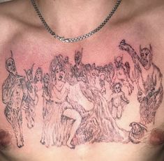 a man with a tattoo on his chest