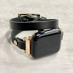 10mm High Quality Black Genuine Leather Bracelet with Gold Accents. Gorgeous Design Slim Leather Jewelry Tailored to Perfection. Designed And Handmade by Simeon D Jewelry Studio. This Bracelet Fits ALL Apple Watch Series. Please Measure Your Wrist Before Submitting Your Order! Not For Other Models. Apple Watch Is NOT Included. Let's be Friends! Follow my Studio on Social Media Instagram @simeondjewelry Pinterest @simeondjewelry Facebook @simeondjewelrystudio Classic Adjustable Leather Apple Watch Band, Modern Double Band Bracelet Watch Strap, Adjustable Black Watch Band With Wrist Strap, Everyday Black Apple Watch Band With Leather Strap, Adjustable Black Watch Bands For Everyday, Classic Adjustable Gold Apple Watch Band, Adjustable Black Bracelet Strap Watch Bands, Adjustable Rectangular Leather Bracelet In Luxury Style, Luxury Adjustable Rectangular Leather Bracelet