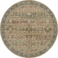 a round rug with an ornate design on the top and bottom, in grey tones