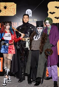 a group of people dressed up in costumes