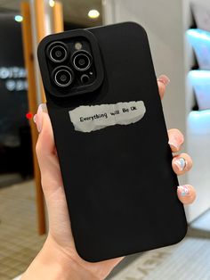 a woman holding up her phone case with the words, just want to be really happy