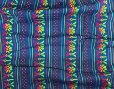 an image of a colorful cloth with flowers on it