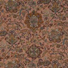 an old rug with many different colors and designs on it's surface, including flowers