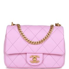 This Chanel Mini Sweetheart Crush flap bag is in pink quilted caviar with antique gold tone hardware, a front flap with CC turnlock closure, half moon back pocket and interwoven antique gold chain link and pink shoulder/crossbody strap The interior is lined in pink leather and features a zipper pocket with Chanel pull and an open pocket below. Collection: 23P Origin: Italy Condition: Pristine; new or never Accompanied by: Chanel box, Chanel dustbag, carebook, COA card, retail UPC and ribbon Meas Chanel Box, Chanel Mini, Chanel Caviar, Diamond Quilt, Flap Bag, Pink Leather, Half Moon, Pink Bag, Handbag Accessories