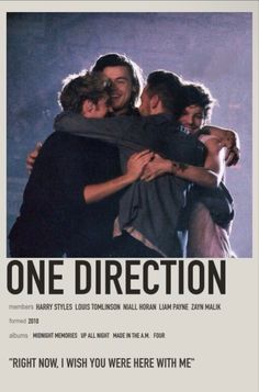 two men hugging each other with the words one direction in front of them on a poster