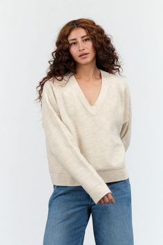 Lauren Manoogian Wide V Neck in Ecru Cream Cashmere V-neck Sweater For Winter, Merino Wool V-neck Sweater For Work, Beige Wool V-neck Sweater For Fall, Cream V-neck Sweater For Workwear In Fall, Oversized Neutral V-neck Sweater, Soft Knit Wool V-neck Sweater, Cream Cashmere V-neck Sweater, Merino Wool V-neck Sweater For Layering, V-neck Merino Wool Sweater