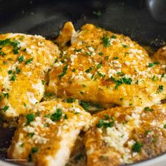 some food is being cooked in a pan on the stove and ready to be eaten