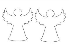 two paper angel cut outs on a white background