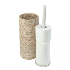 a toilet paper holder with a roll of toilet paper next to it on a white background