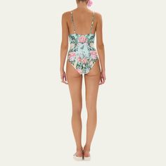 Camilla one-piece swimsuit in Petal Promise Land print brimming with luscious blooms, butterflies, and intricate lines of illustrative flora Sweetheart neckline Adjustable straps Fitted-shaped bust cup Sleek underwire support Moderate seat coverage  Nylon/polyamide/elastane Imported